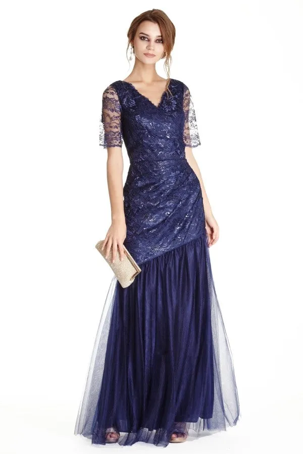 Lace mermaid dress with sheer lace half length sleeves, v-neckline, asymmetric hemline, full length skirt.